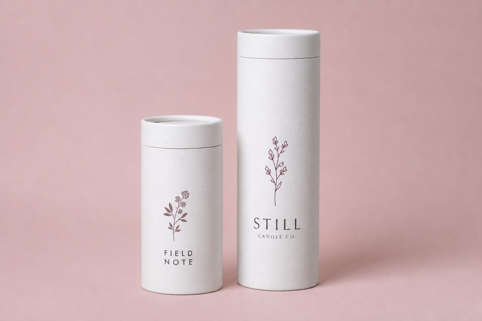 Two branded white kraft cardboard tubes with short butt joint lids
