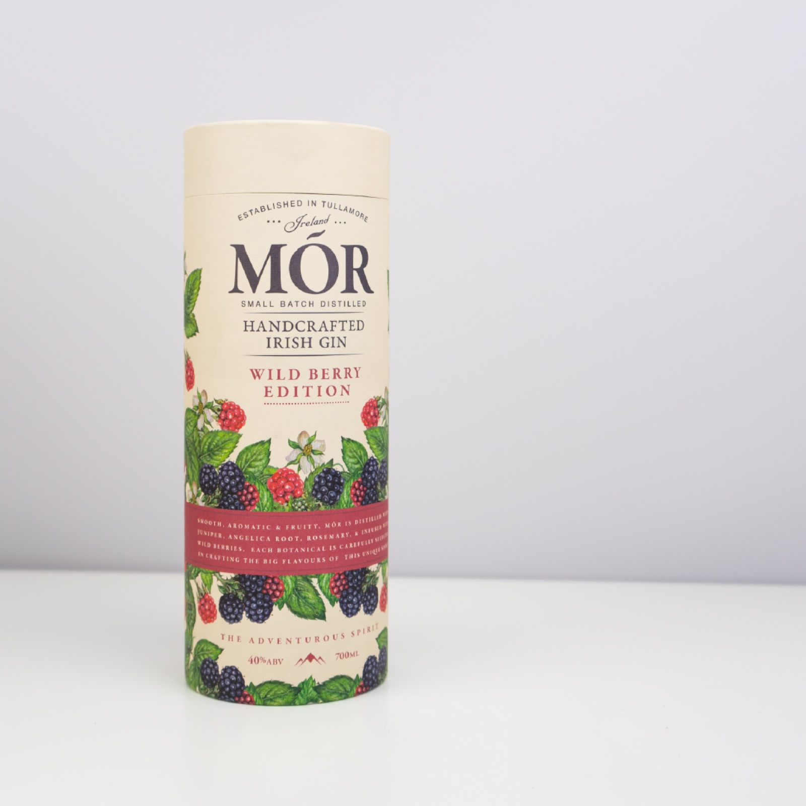 Printed Mór gin cardboard tube with a short butt joint lid