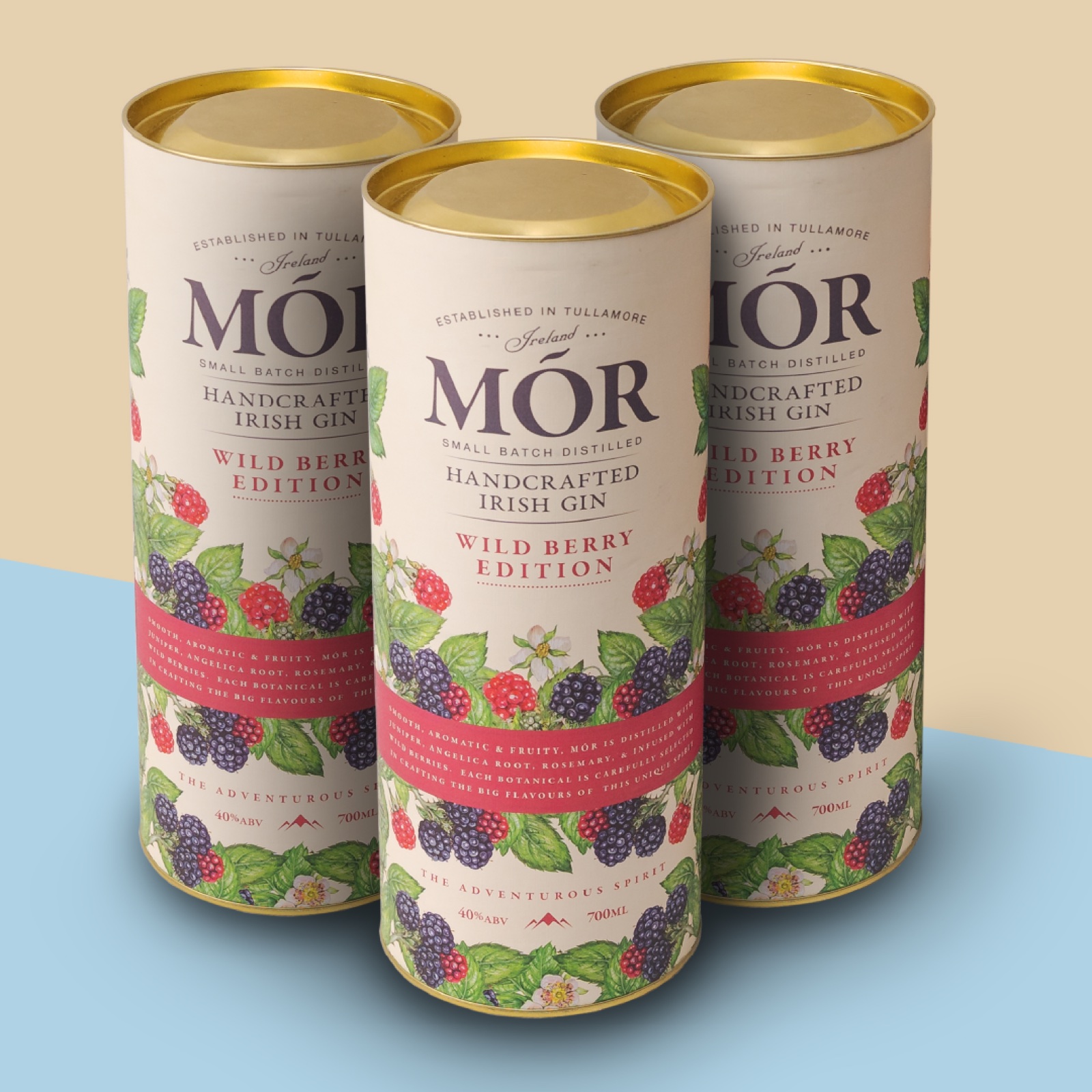 Printed Mór gin cardboard tubes with gold metal lids