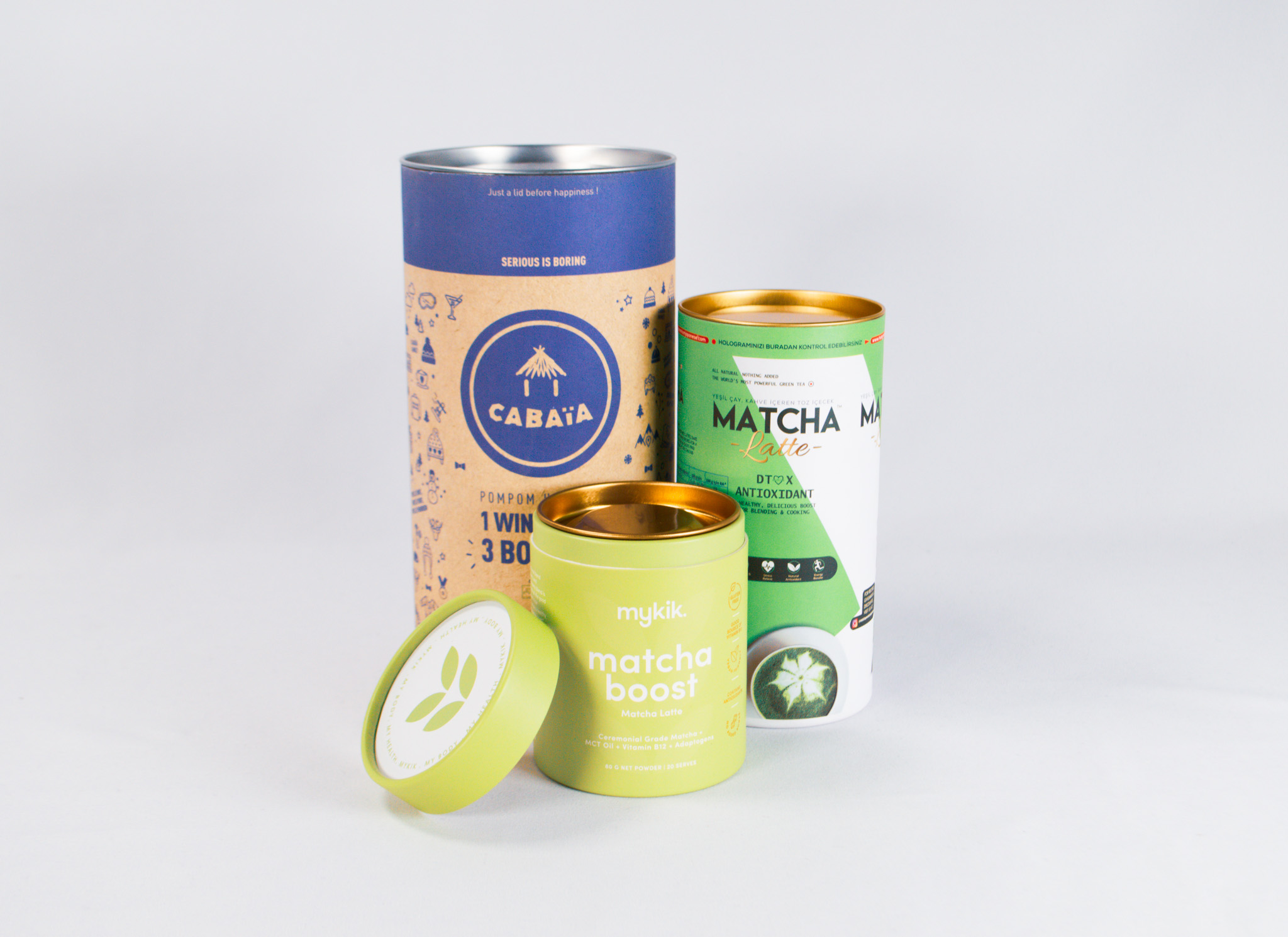 Printed cardboard tube with a metal tin lid