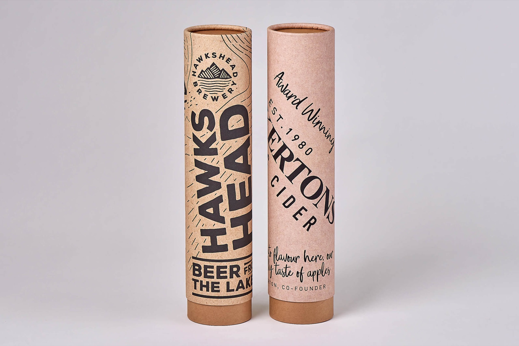 Two printed Hawkshead Brewery telescopic cardboard tubes with full-height outer sleeves and exposed inner bases
