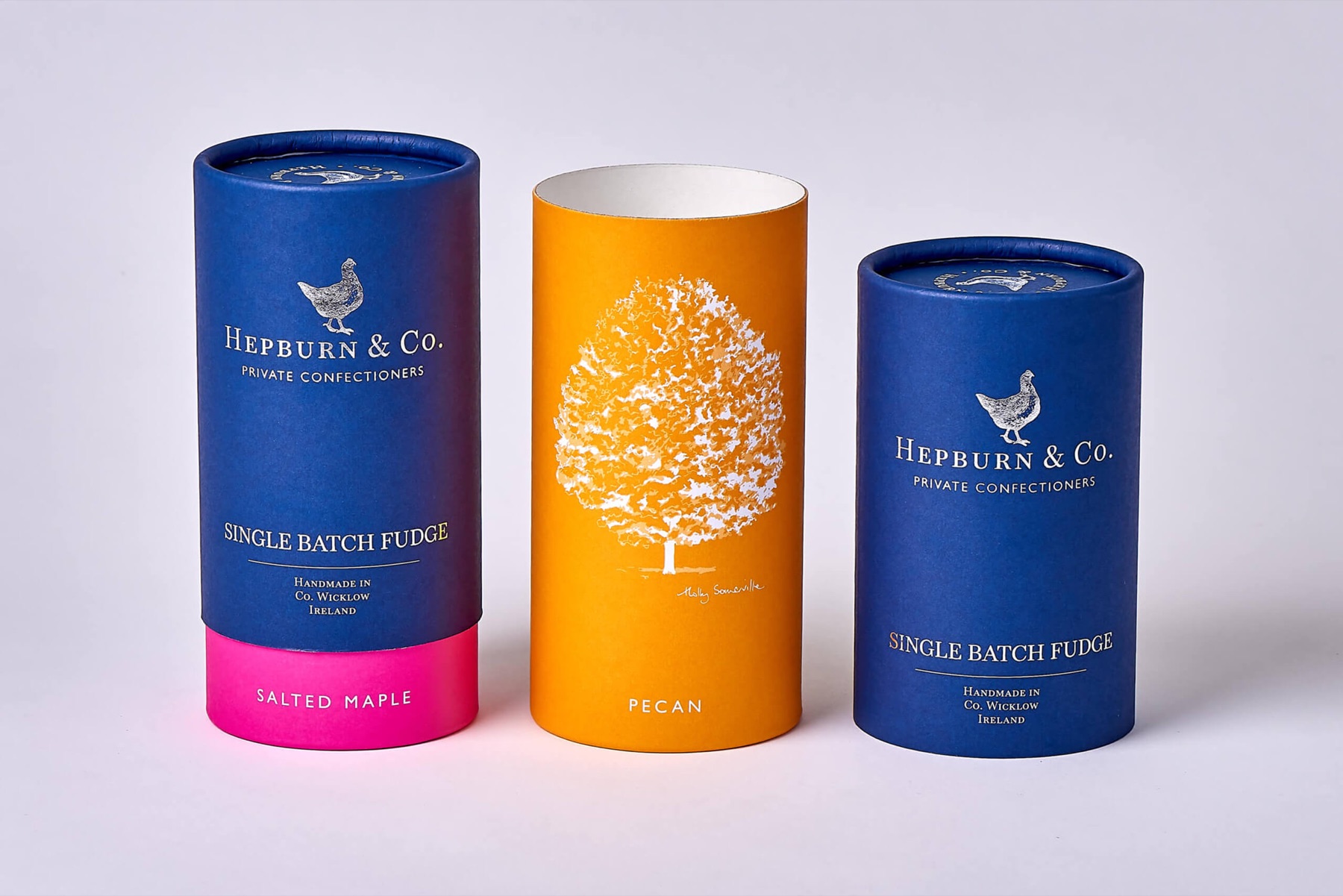 Hepburn and Co confectionery tubes with full-height printed outer sleeves and contrasting inner bodies